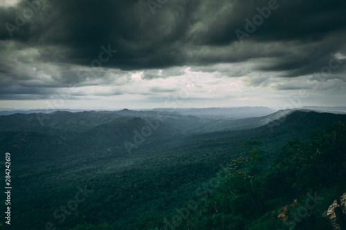 Chaiyaphum Province Landscape in Thailand with Rocks and Jungles Beyond the Horizon and Stormy Clouds.