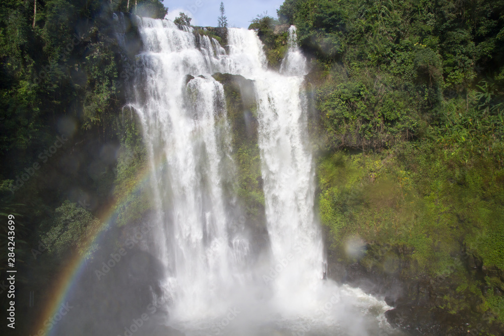 Obraz premium Nice View of Waterfall with Rainbow in South of Laos