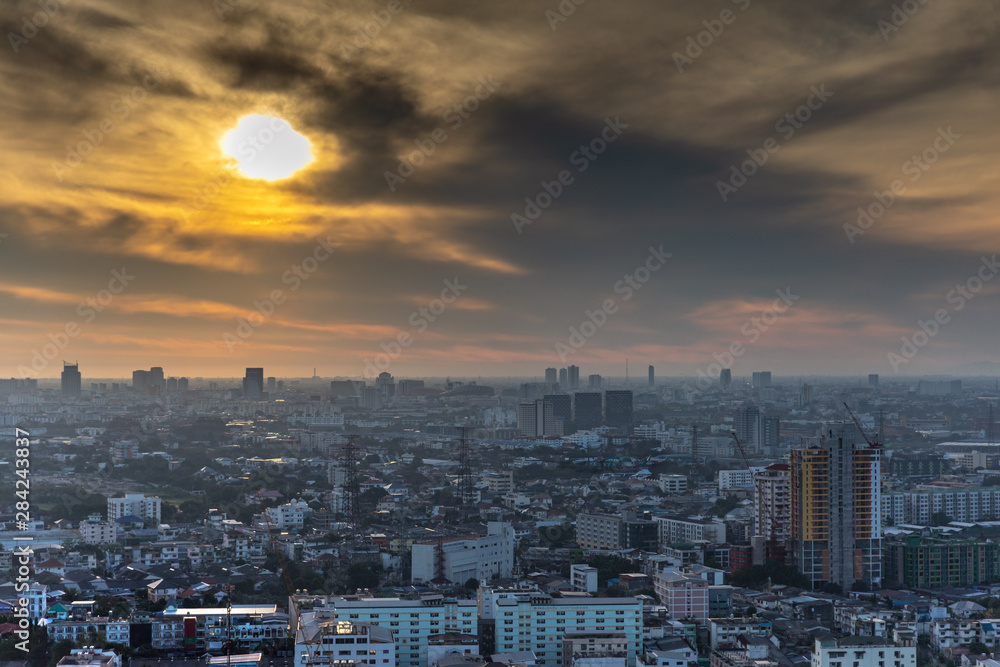 Bangkok city with dramatic clouds over the skyline in Thailand.