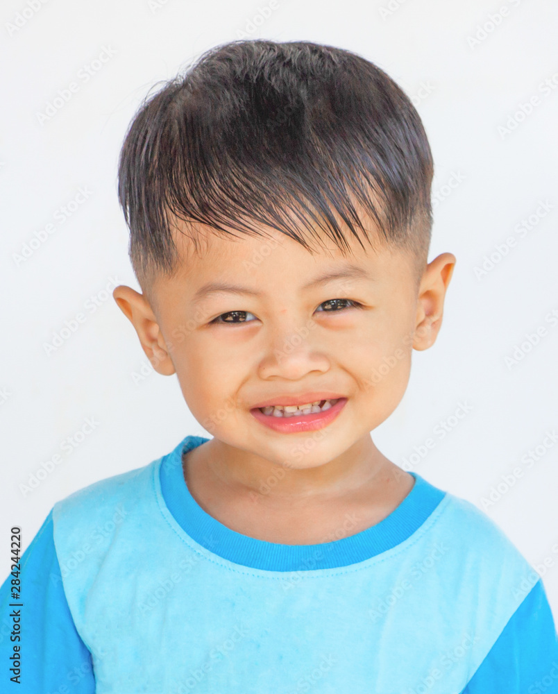 close-up portrait of smiling boy isolated on white background,funny little boy. close-up portrait of smiling boy isolated on white background,funny little boy.