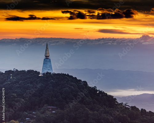 Wat Pa Phu Thap Boek in Phetchabun, Thailand with sunrise and fog in the distance. © Andrew