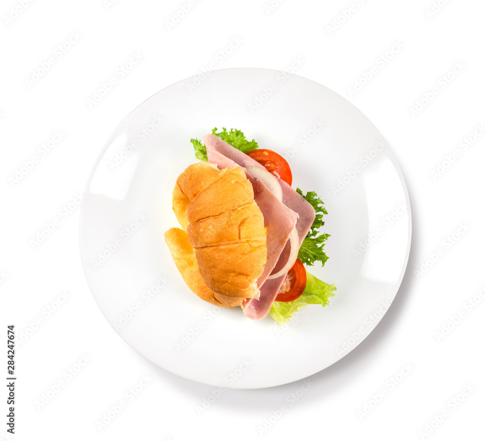 Big croissant with green salad and pork meat on isolate white background. Tasty croissant Food photo. Healthy food concept. Big croissant with green salad and pork meat on isolate white background. Tasty croissant Food photo. Healthy food concept.