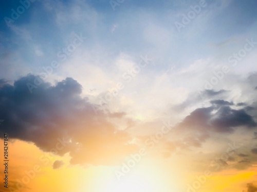 Beautiful sky from blue and yellow light from the sun For making background. © Tanapat Lek,jew