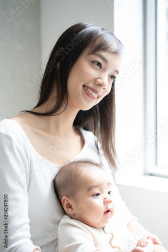 Young mother holding her baby