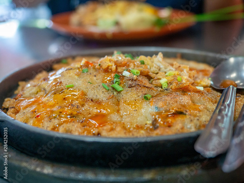 Mussel omelette,good tasty food,In restaurant at Market (Sampeng),Bangkok,Thailand,Food Thai