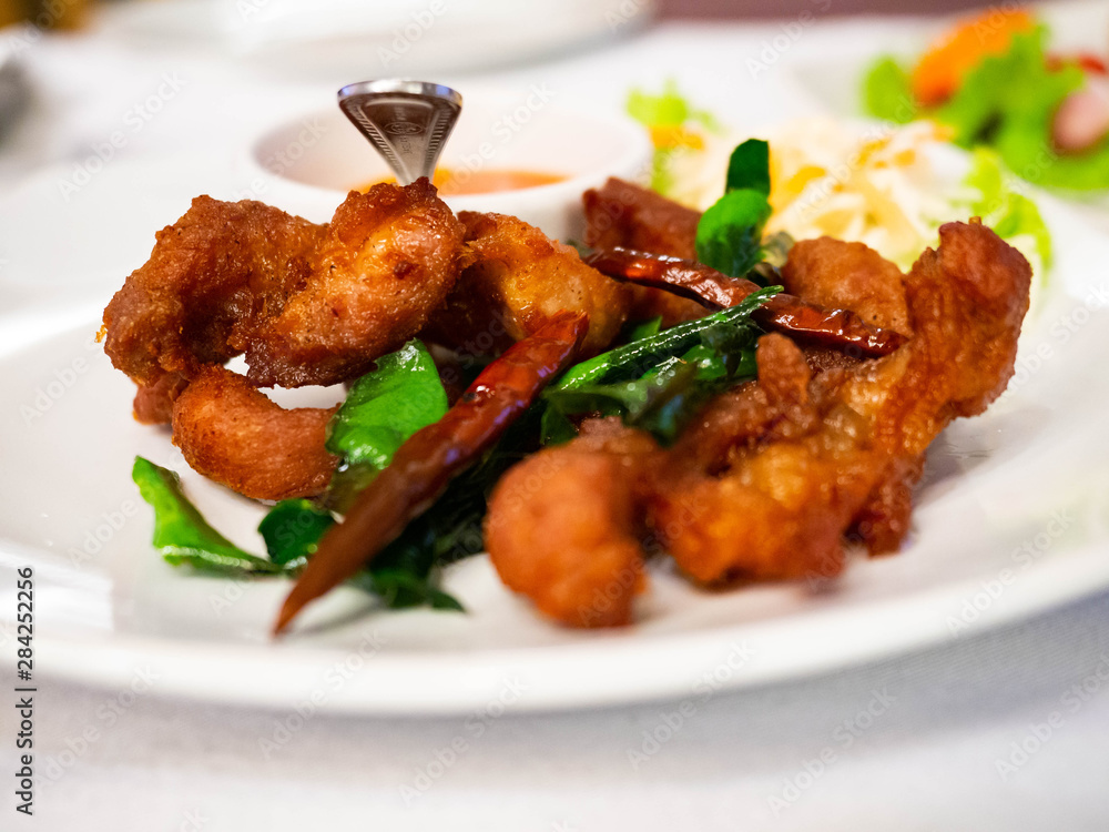 Fried pork Spicy ,In Room,Meeting in restaurant,Food Thailand,Healthy,Dinner of young friends Fried pork Spicy ,In Room,Meeting in restaurant,Food Thailand,Healthy,Dinner of young friends