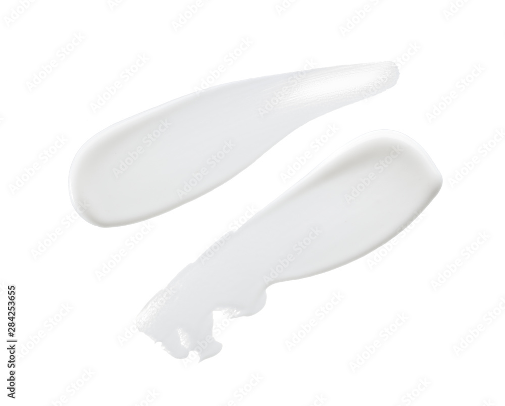 White smears and texture of face cream or acrylic paint isolated on white background White smears and texture of face cream or acrylic paint isolated on white background