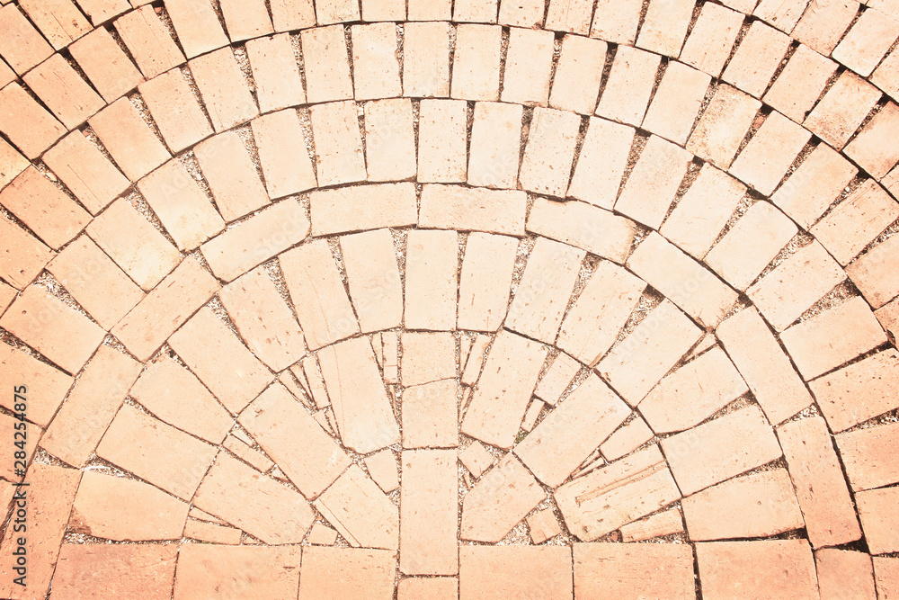 Fototapeta premium Brick pavement light brown floor background in semicircle seamless patterns texture top view