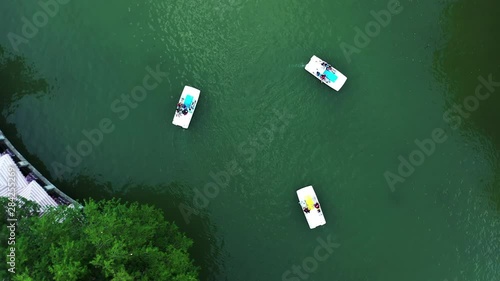 Aerial view top view. Catamaran for tourism on the lake in the park.