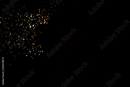 Dark Abstract Gold bokeh. © jittawit.21