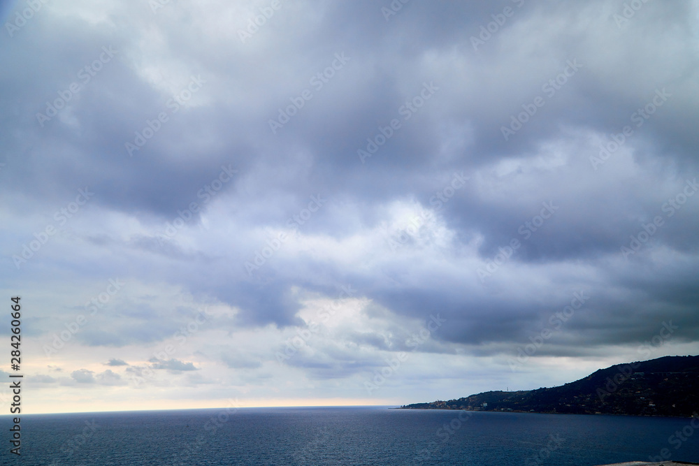 Dramatic storm sky with clouds over the sea