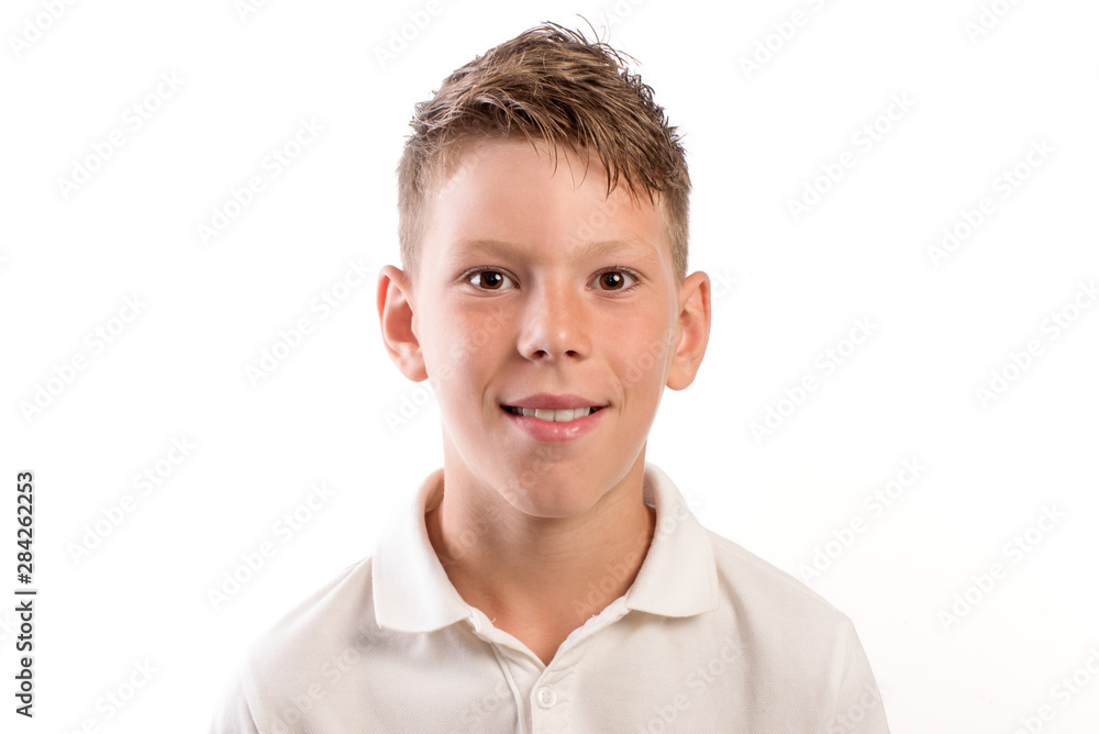 Studio portrait of 9 year old schoolboy on white background Studio portrait of 9 year old schoolboy on white background
