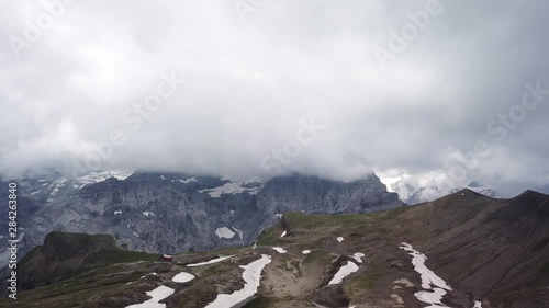 Breathtaking peak mountains of Muttsee/Limmernsee at Linthal range, aerial shot photo