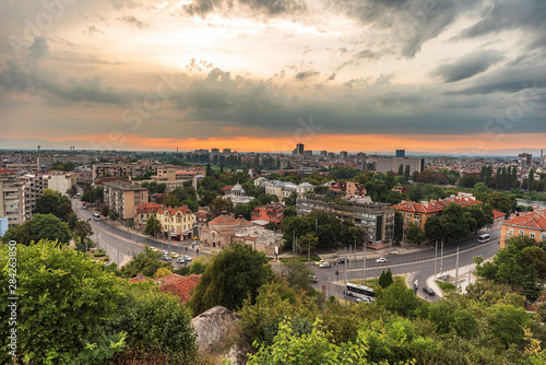 Summer sunset. Photo from Nebet tepe Hill in Plovdiv city, Bulgaria. Panoramic view with warm sunset. Ancient Plovdiv is UNESCO's World Heritage.