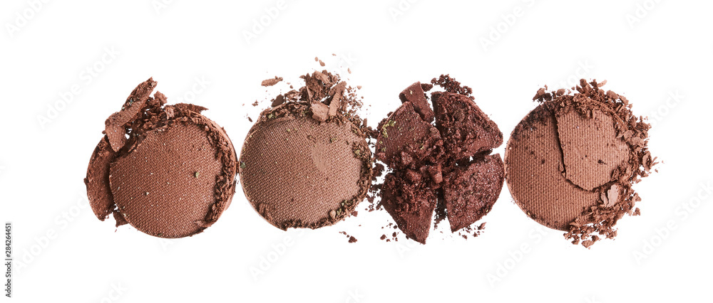 Broken eyeshadows in trendy shades isolated on white background Broken eyeshadows in trendy shades isolated on white background