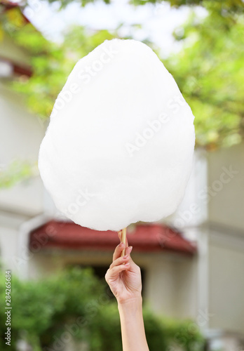 Hand holding fluffy white c...