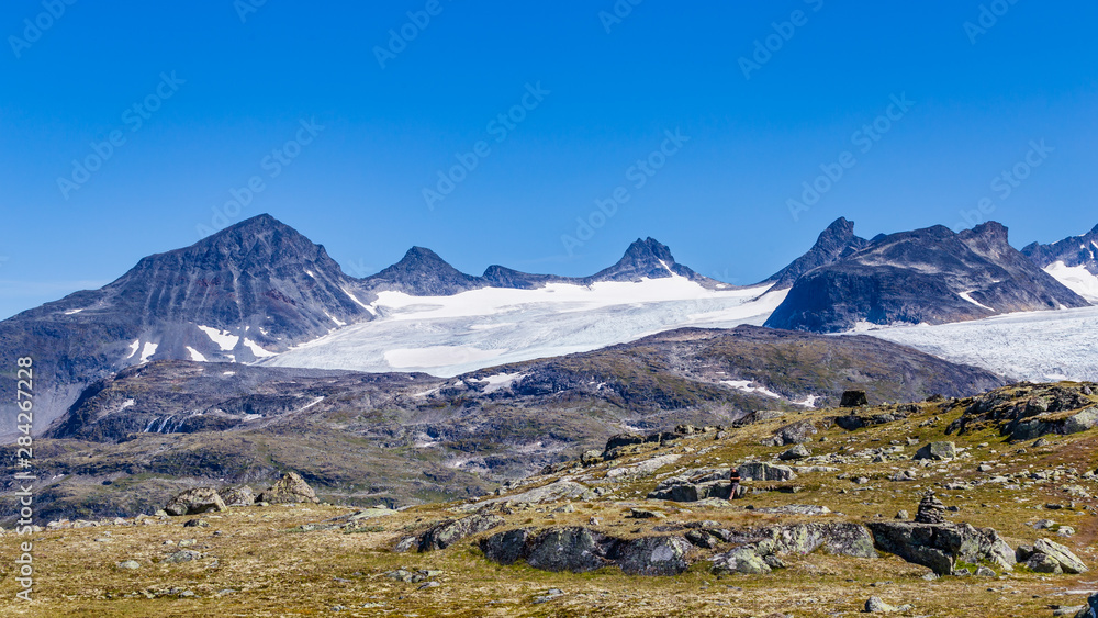 View Krossbu glacier Smorstabbrean from Sognefjellshytta along National scenic route Sognefjellet between Skjolden and in Western Norway.