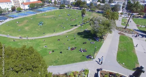 4K Drone footage over SF's Dolores Park with family and kids having a picnic! photo