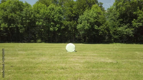 Hayball in a field – static shot photo