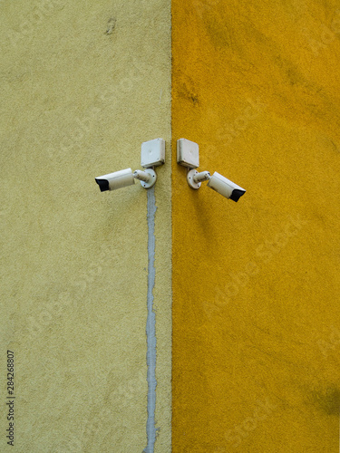 Cameras placed on the corner of the building.