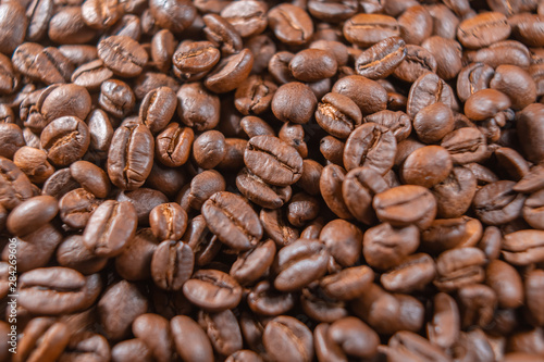 Coffee beans close up. Coffee production industry concept