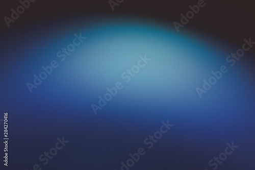 Smeared blue and purple soft glow. Defocused lens flare. Abstract art background.