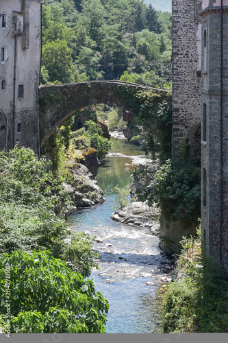 Magra River with the ancient bridge in Bagnone, a small town in Tuscany, Italy