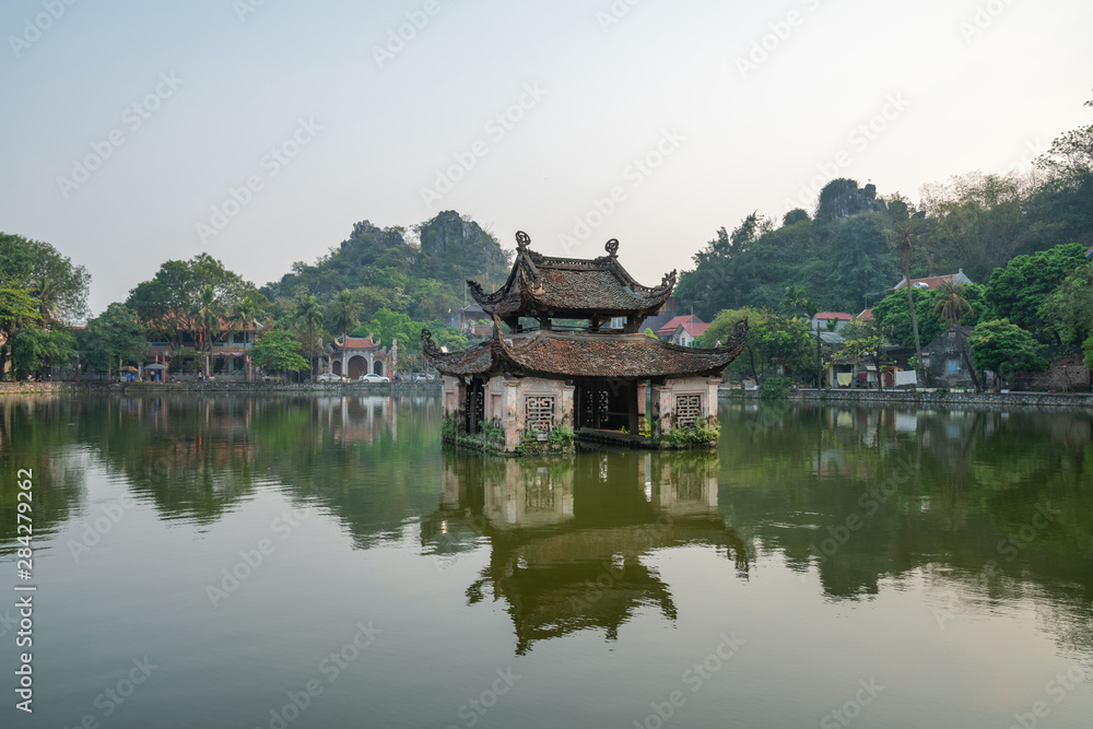 Floating temple in Thay Pagoda or Chua Thay, one of the oldest Buddhist pagodas in Vietnam, in Quoc Oai district, Hanoi Floating temple in Thay Pagoda or Chua Thay, one of the oldest Buddhist pagodas in Vietnam, in Quoc Oai district, Hanoi
