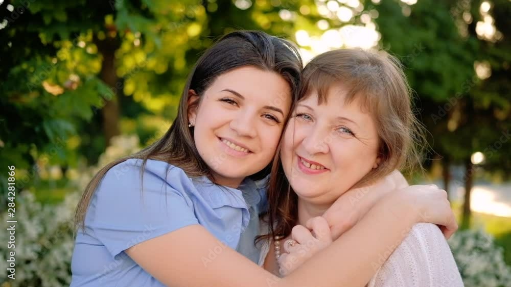 International women day. Greeting joy happiness. Smiling mother daughter embracing enjoying time. International women day. Greeting joy happiness. Smiling mother daughter embracing enjoying time.