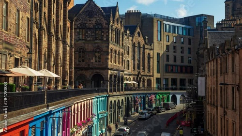 Time lapse view of colourful Victoria street in Edinburgh old town photo
