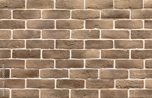 Photography Horizontal photo of brown brick wall with light in the retro style