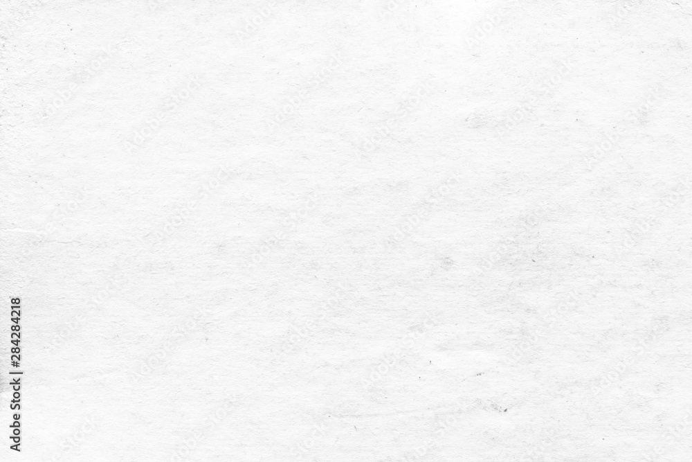 Fototapeta premium Cardboard white texture close-up. Light old paper background. Grunge concrete wall. Vintage blank wallpaper.