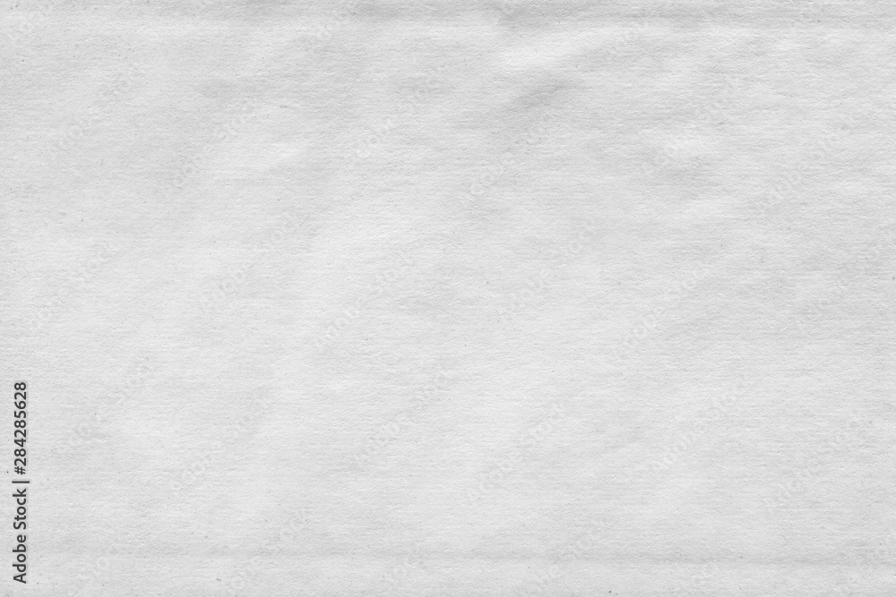 Cardboard white texture close-up. Light old paper background. Grunge concrete wall. Vintage blank wallpaper. Cardboard white texture close-up. Light old paper background. Grunge concrete wall. Vintage blank wallpaper.