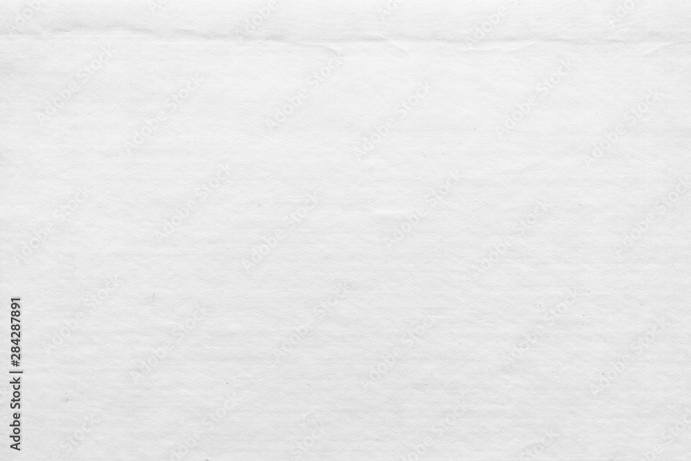 Fototapeta premium Cardboard white texture close-up. Light old paper background. Grunge concrete wall. Vintage blank wallpaper.