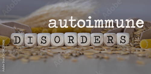 Words AUTOIMMUNE DISORDERS  composed of wooden dices. photo