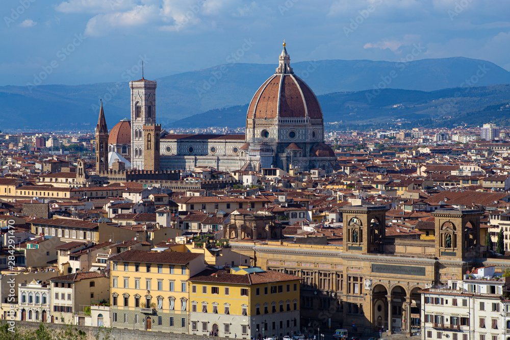 Florence, Tuscany, Italy: Panoramic view of the old town with towering Cathedral of Santa Maria del Fiore and Giotto's bell tower