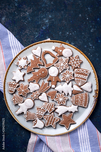 Christmas homemade baking concept cinnamon and ginger cookies of different shapes