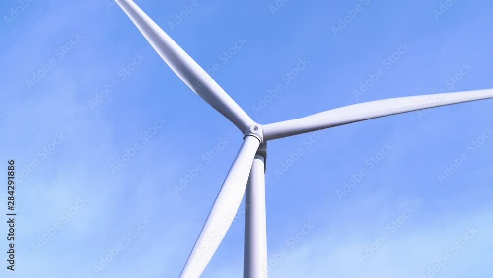 aerial view of summer countryside with wind turbines aerial view of summer countryside with wind turbines