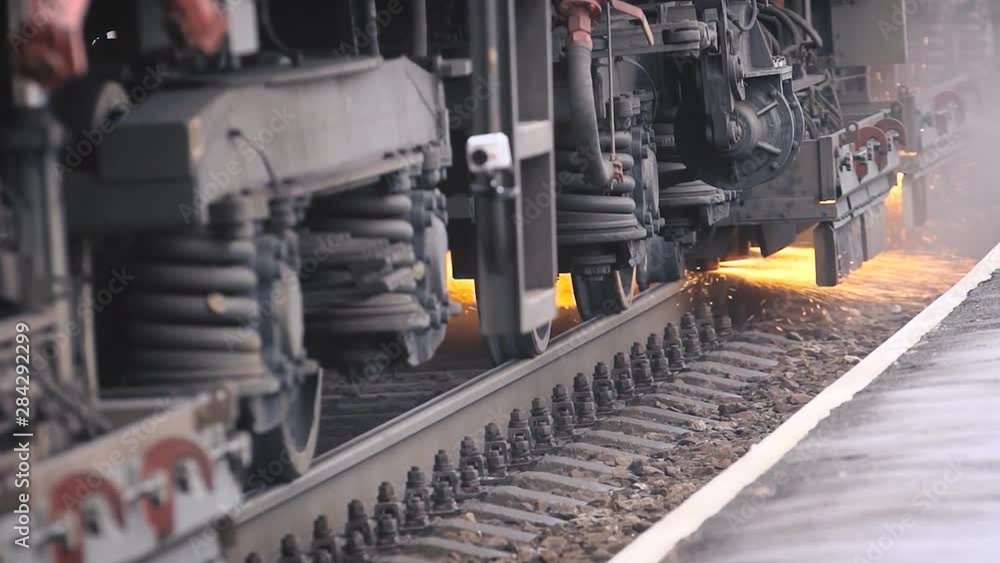 from under the car of a train sparks from under the car of a train sparks