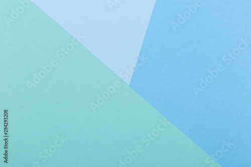 Paper blue  green  pastel empty background  geometrically located. Color blank for presentations  copy space.