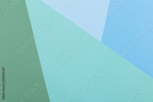 Paper blue  green  pastel empty background  geometrically located. Color blank for presentations  copy space.
