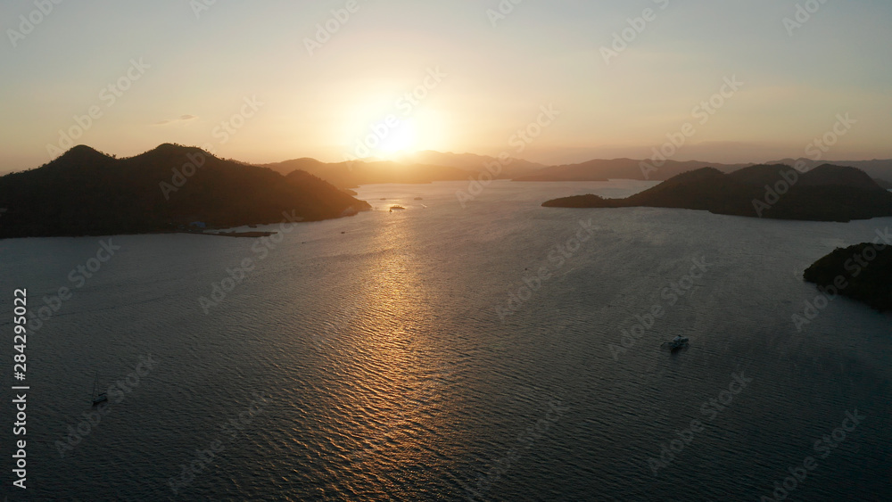 aerial view sunset over the sea with islands. Philippine Islands in the evening. Busuanga, Palawan, Philippines
