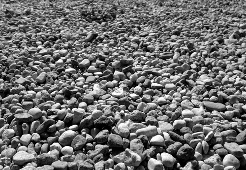 Pile of small gravel stones in black and white.