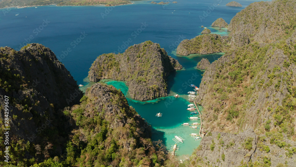 Aerial drone lagoons and coves with blue water among the rocks. lagoon, Kayangan Lake.mountains covered with forests. Seascape, tropical landscape. Palawan, Philippines, Busuanga