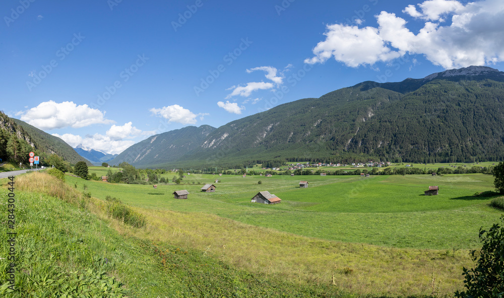 tyrolean landscape with fresh grass and bright meadows at Tarrenz, Austria
