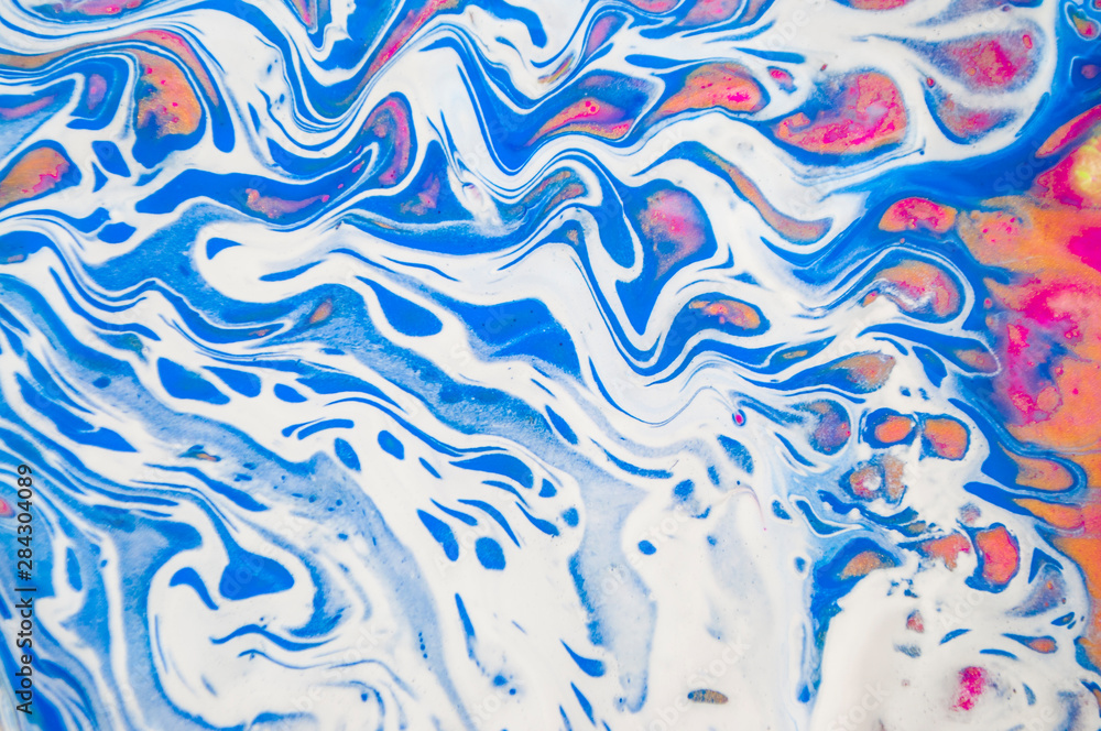 Abstract colorful painting background made in fluid art technique. Trendy multicolored pattern.