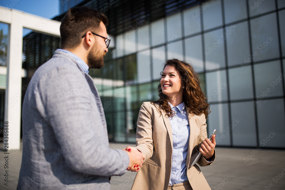New business meeting,image of two business person handshaking New business meeting,image of two business person handshaking