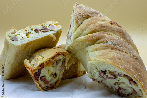 Naples. Il Casatiello a pizza stuffed with ham, cheese, eggs, salami, pepper.