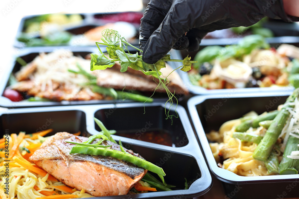 Fototapeta premium Meal prep. Appetizing lunch boxes. A balanced healthy diet
