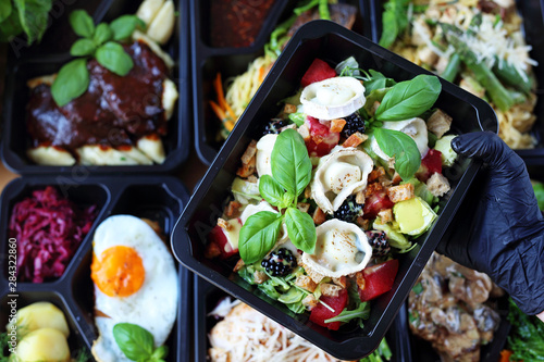 Catering. Appetizing lunch boxes. Food delivered to your doorstep